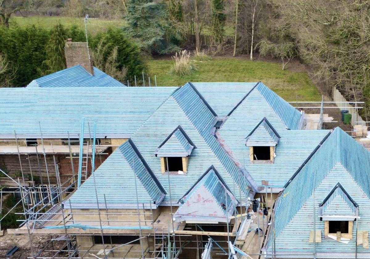 Aerial photo of a new roof under construction with breathable membrane visible, by HK Builders Ltd